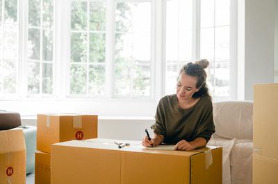 Image Source: Pexels (https://www.pexels.com/photo/woman-signing-box-near-large-window-in-sunlight-at-home-4246196/)